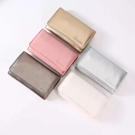 snap button tri-fold handbag